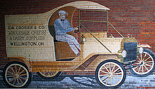 Spirit of ’76 Museum The mural in an alley that separates the Spirit of ’76 Museum's building from the one next to it celebrates Wellington's history as the one-time largest cheese making center in the United States