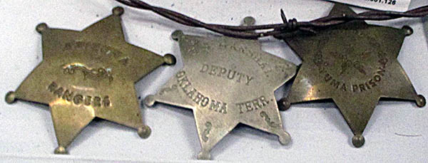 Motts Military Museum In the center is a U.S. deputy marshal's badge behind which is an authentic piece of barbed wire used in North Dakota.