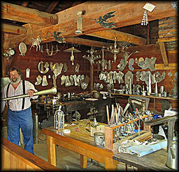 Sauder Village Tinsmith in his shop
