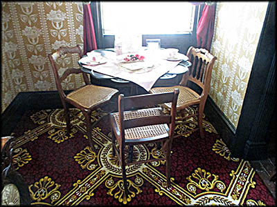 Wolcott Heritage Center This table and chair set is in the Wolcott House's parlor.